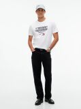 White TH x Cadillac Formula 1® Team Austin T-Shirt  Unisex