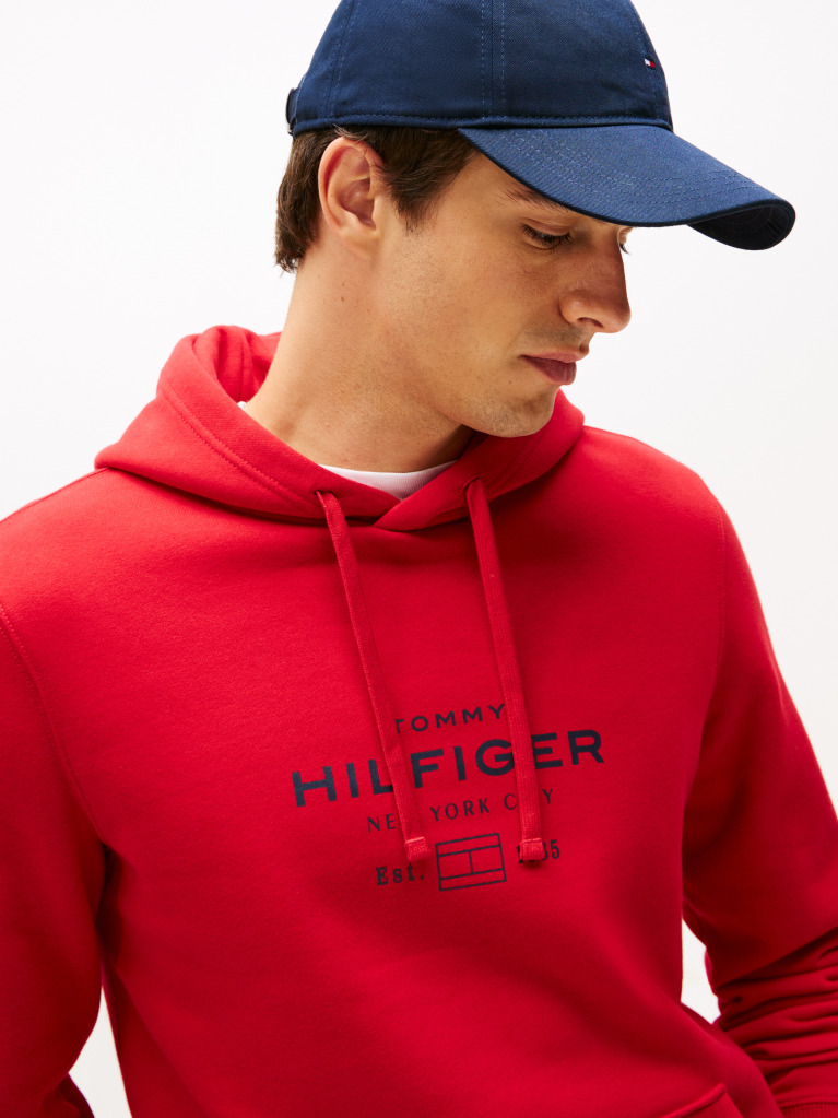 Red Perfect for fighting the cold, this warm hoodie is enhanced with a stylish, tonal Tommy Hilfiger logo and crafted from high-quality interlock knit.  Men